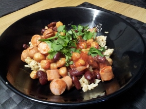 Spicy tomoato sauce with beans and hot dog